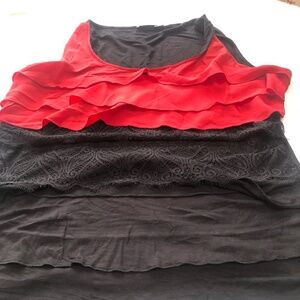 Ricki’s frilly red  and black top, sleeveless with ruffles down front -like new